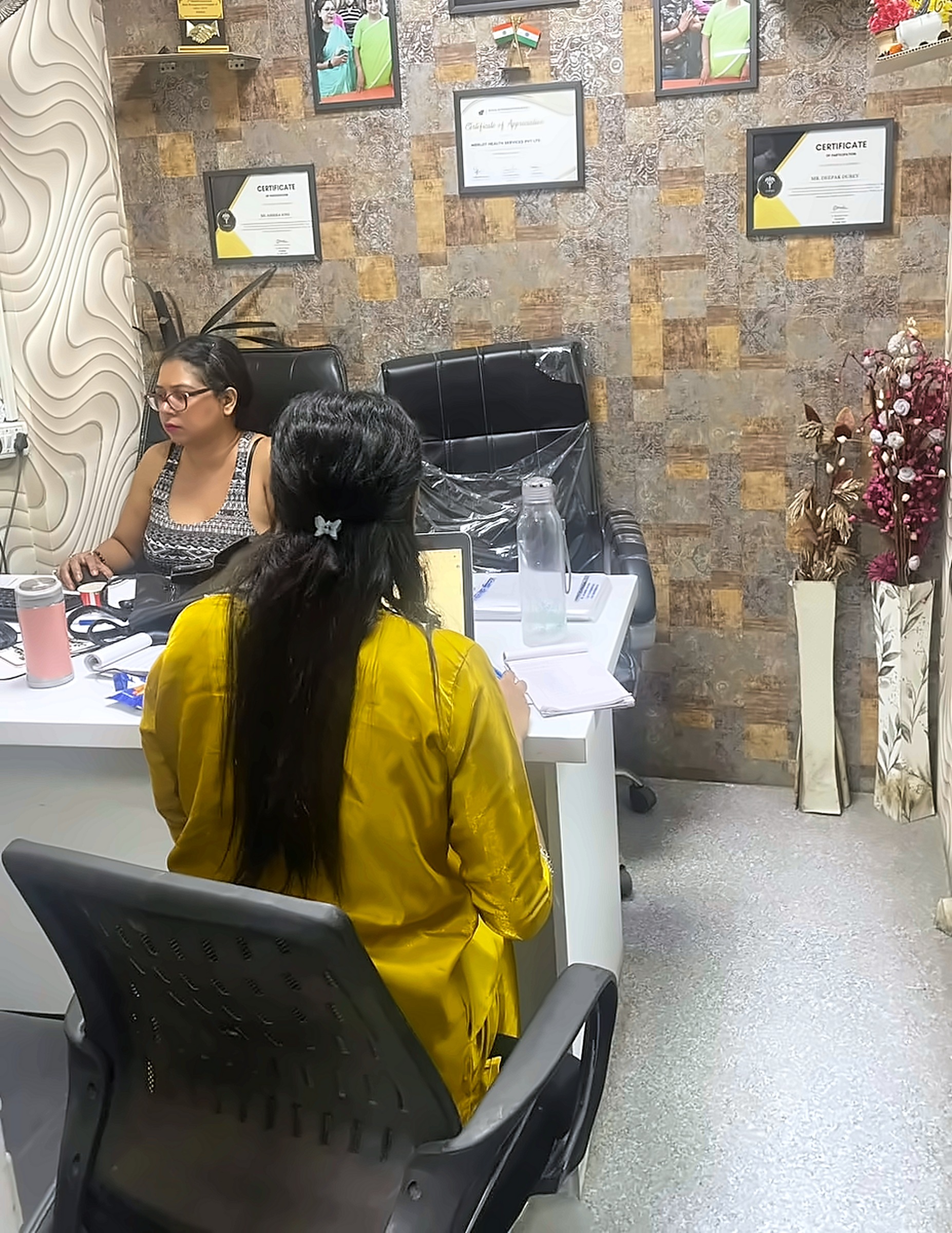 Saturn Associates team reviewing insurance claims